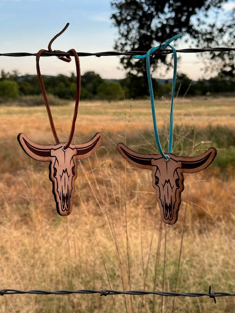 Custom Leather Freshie - Lonhorn Steer Heads hanging on a fence