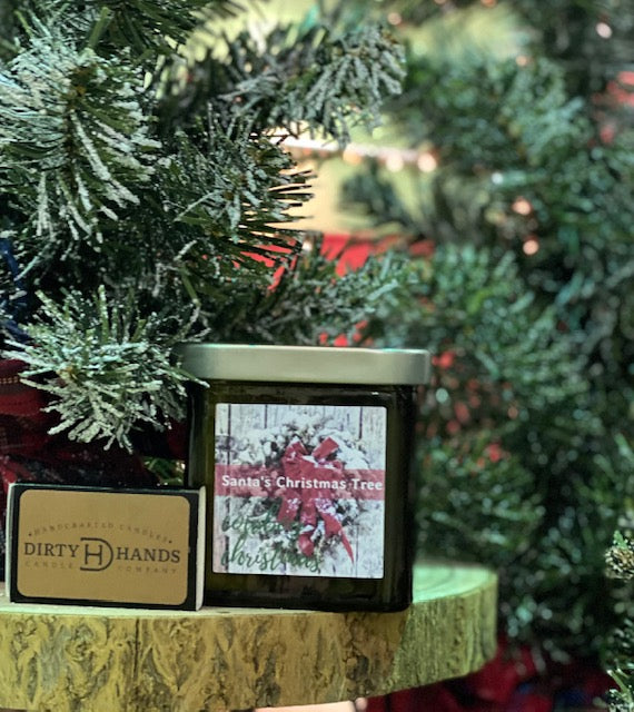 A Green Candle sitting under a Tree