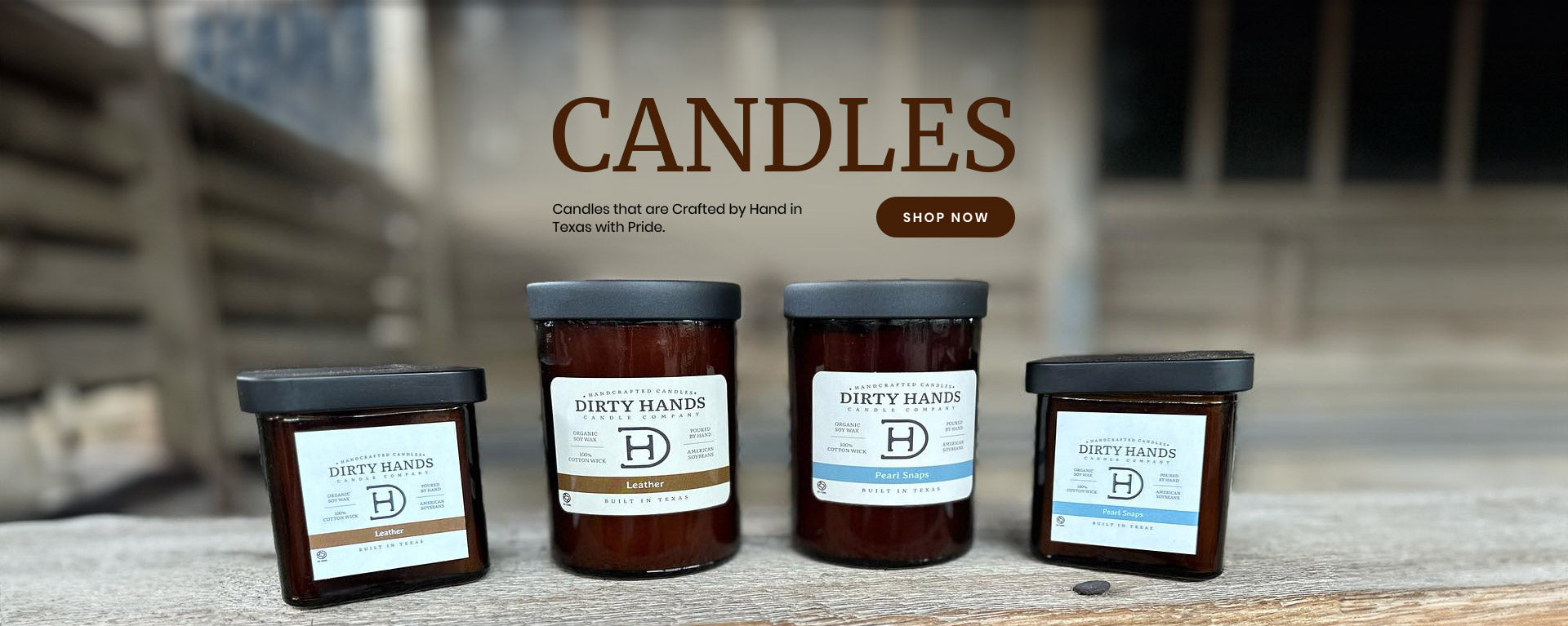 Pearl Snaps and Leather Candles sitting on a wooden bench 