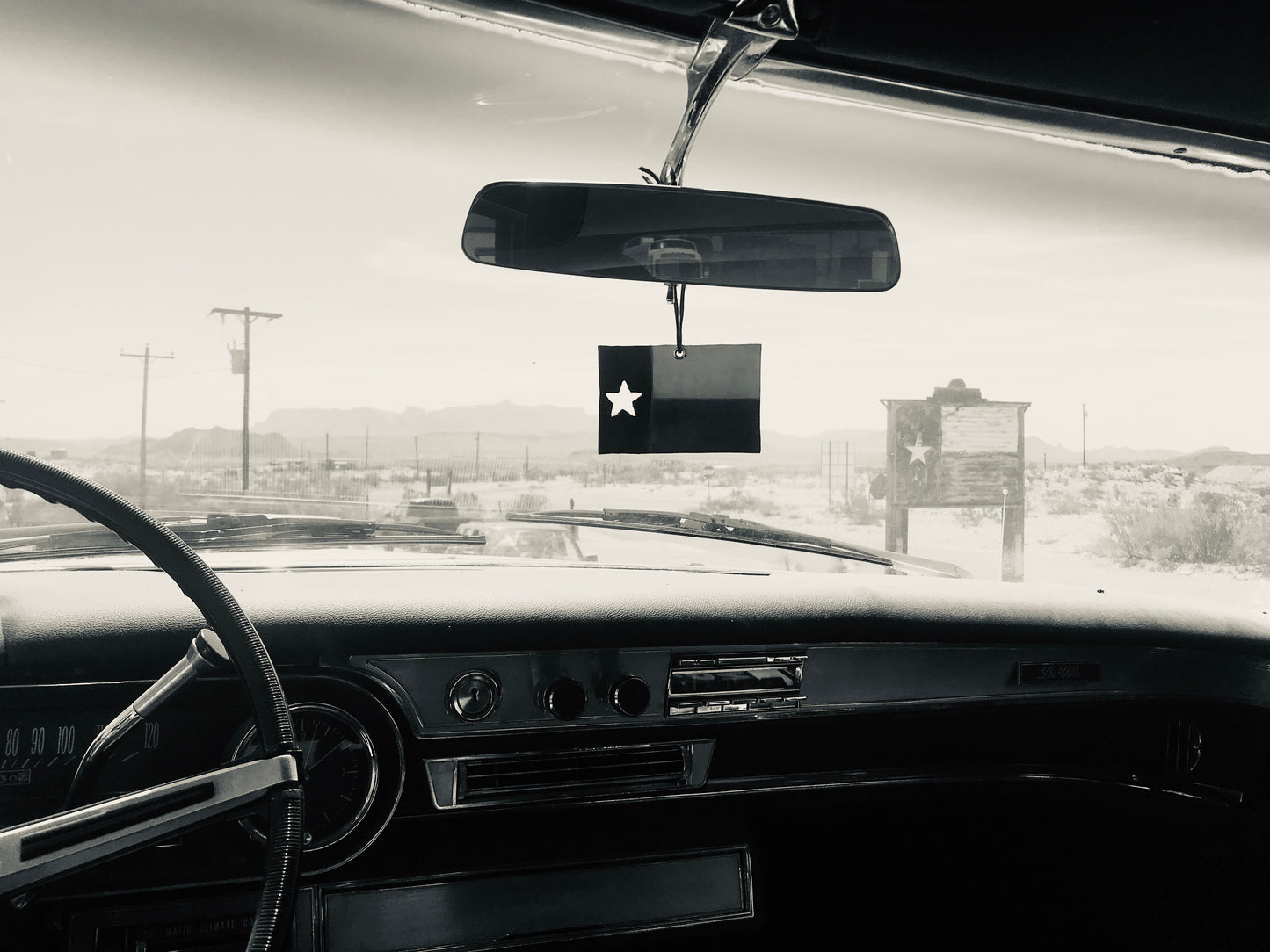 Texas Flag Car Freshener Handing from a Car Mirror